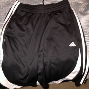 Black adidas shorts.
